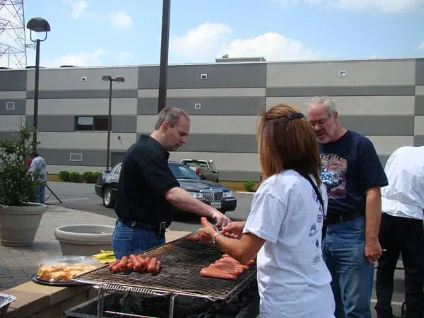 As we arrive at Annapolis Harley, The family is getting all the food ready to serve. (brothers-in-law Wayne, Larry and sister-in-law, Fran. Sister Iris & Natalie are checking in riders as they arrive behind the scenes.