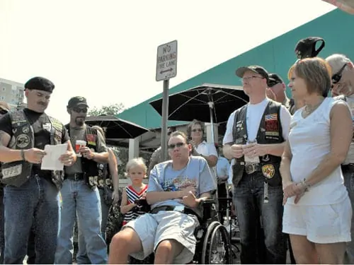The start of a great day. Rocky (VP Nam Knights Old Line Chapter) introduced our wounded Hero Sgt. Eric Edmundon & his daughter Gracie, then briefed everyone on the ride ahead.