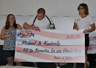 Honoring Sgt. Michael Colon, wounded and lost his arm. Faces of Valor USA, purchased everything needed for their newborn twins.