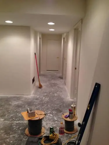 Basement just about all sheet rocked and getting close to putting in the floor