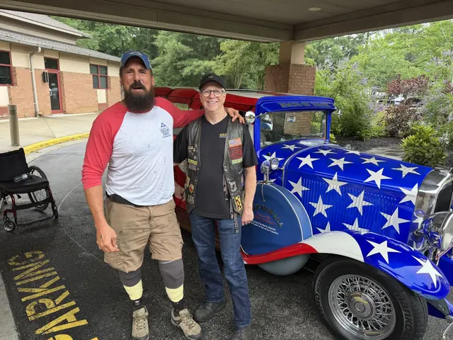 Chris Corbin and Ted Levitt with the Faces of Valor car